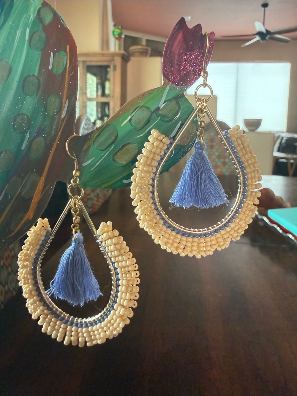 Gold beaded with blue fringe earrings